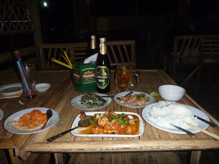 A sumptuous feast for $6 each after an exhausting day. Sweet and Sour fish, tomato, carrot and morning glory salad with rice, washed down with 2 local beers and watermelon juice. Mmmm.